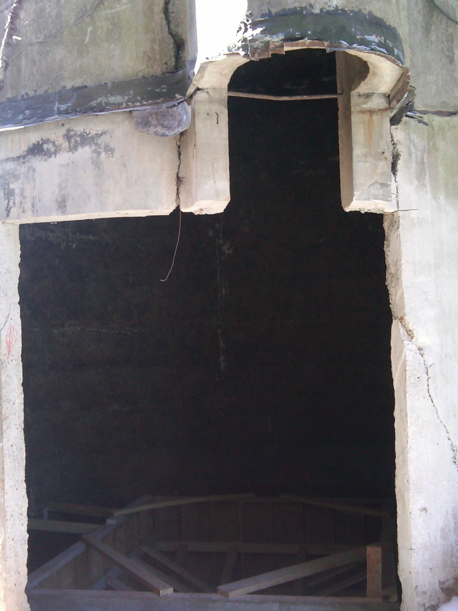 A peek into a silo... You can see the startings of an elevator shaft below.